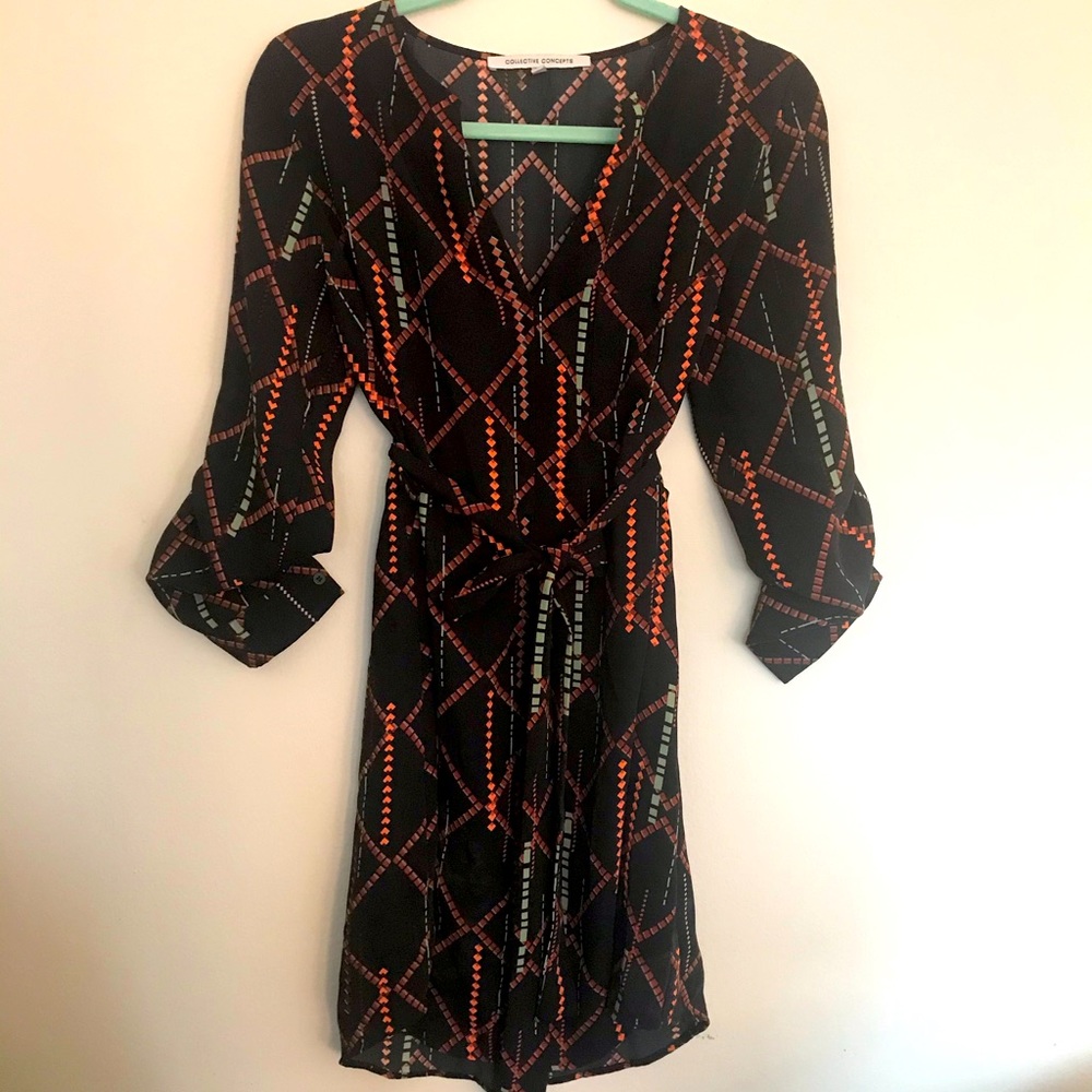 Black tie front dress with orange and green detail